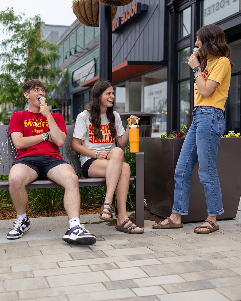 Students eating ice cream on the square